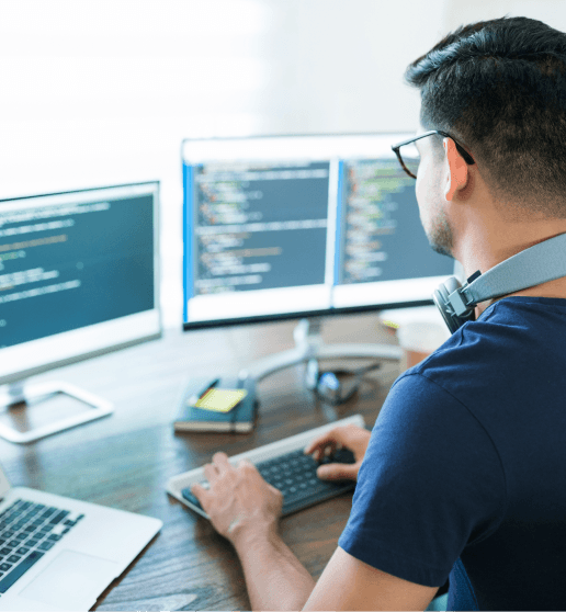 Rear View Young Latin Software Developer Programming While Working From Home